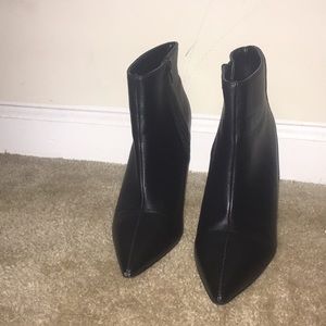 A black leather bootie